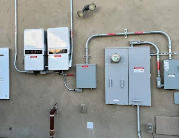 An outdated panel with a double-tapped breaker, a serious safety hazard that A-1 Contractors can fix.