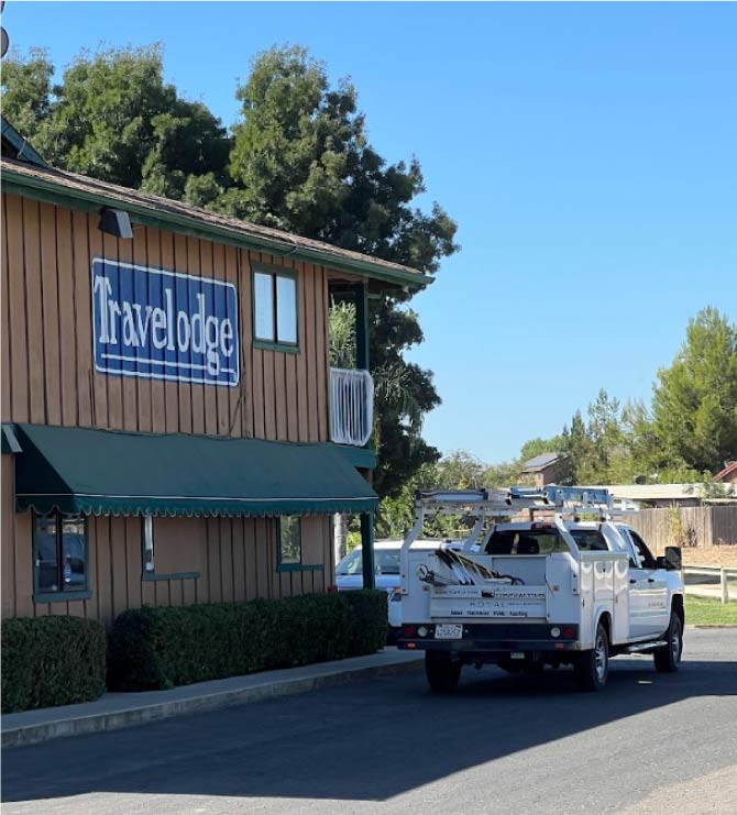 Modern commercial property exterior with energy-efficient outdoor lighting.