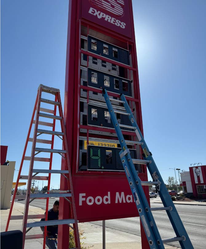 Professional commercial Electrician in Lemoore, ca installing modern, energy-efficient lighting 